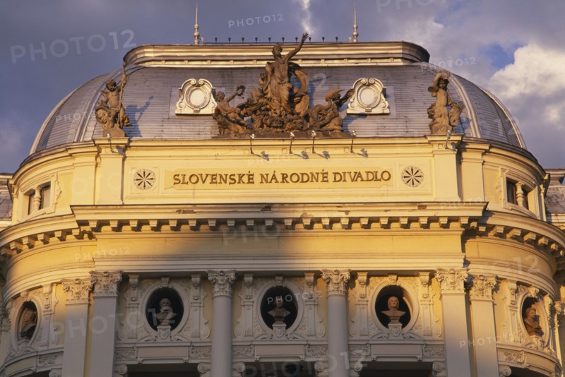 SLOVAKIA, Bratislava, "Slovenske Narodne Divadlo, the Slovak National Theatre.  Detail of facade with statues and carvings in Neo-Classical style, built 1885-1886."