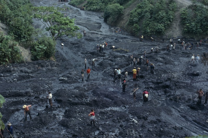 COLOMBIA, Industry, Mining Emeralds, Muzo Emerald Mine in Cordillera Oriental of Colombian Andes. View over guaceros  illegal workers searching in slurry washed down from main mine above  to find emeralds missed by the official syndicate miners.