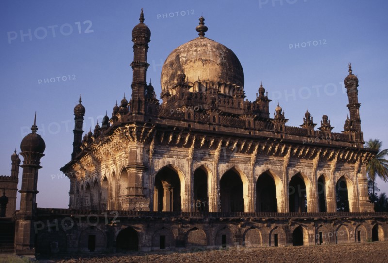 INDIA, Karnataka, Bijapur, Ibrahim Roza.  Exterior of mausoleum constructed by Ibrahim Adil Shah II (1580-1626) for his queen Taj Sultana.  Both are buried here with other family members.