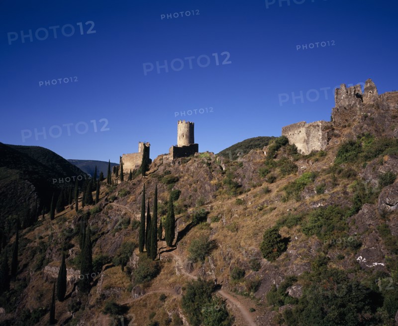FRANCE, Languedoc-Roussillon, Aude, "Chateaux de Lastours. Cathar castles.  From left to right Chateau Cabaret (mid-eleventh century), Tour Regine (added after 1240), and Surdespine (1153)"