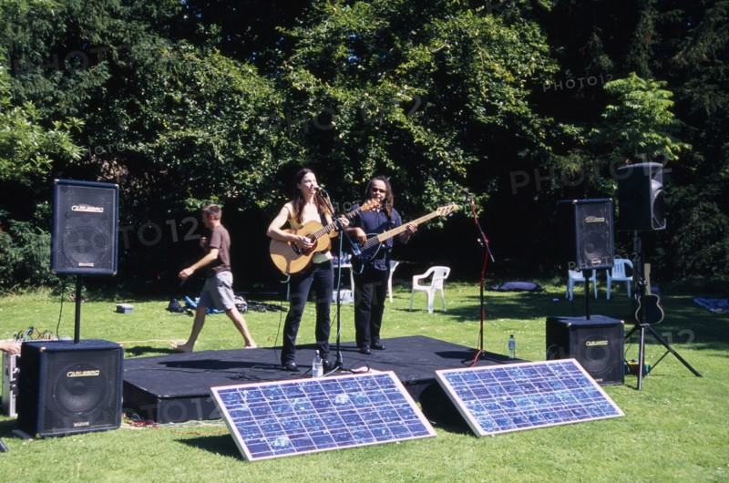 ENGLAND, East Sussex, Lewes, Guitar festival performers with solar powered amplifier systems.
