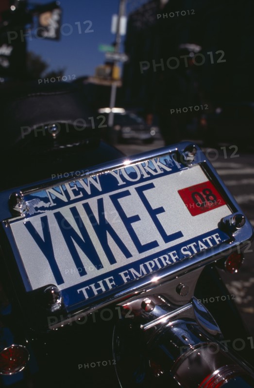 USA, New York, New York City, Detail of motorbike number plate YNKEE