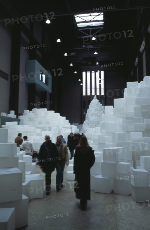 ENGLAND, London, "Tate Modern. Turbine Hall. Exhibition by Rachel Whiteread called Embankment. 14,000 transluscent white polyethylene boxes stacked in various ways. Visitors walking around exhibit."