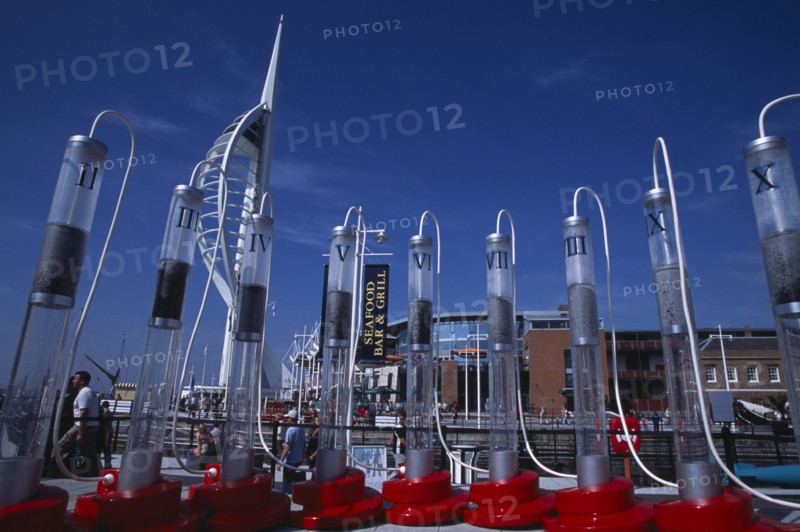 ENGLAND, Hampshire, Portsmouth, "Gunwharf Keys. The Spinnaker Tower, seafood restaurants and bars seen through a large plastic commercial vodka display "