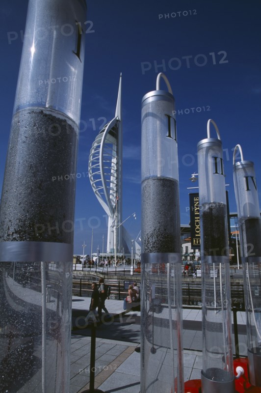 ENGLAND, Hampshire, Portsmouth, Gunwharf Keys. The Spinnaker Tower seen through a large plastic commercial vodka display