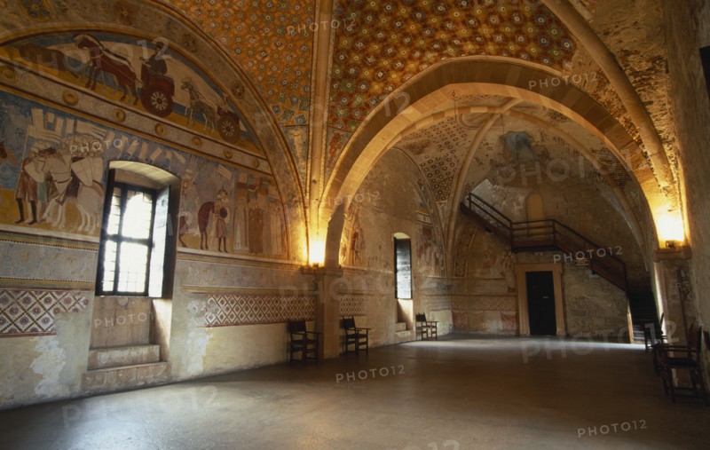 ITALY, Lombardy, Lake Maggiore, Angera.  Interior of reception hall in Rocca di Angera medieval castle with painted vaulted ceiling and fresco wall decoration.
