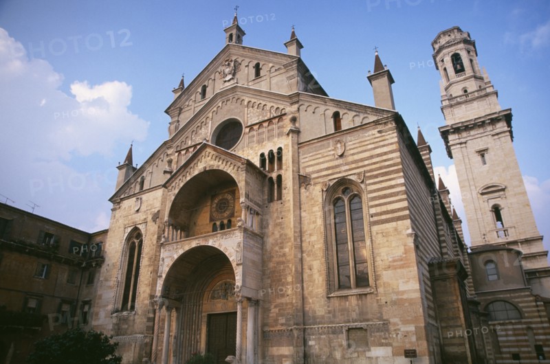 ITALY, Veneto, Verona, Romanesque facade of Duomo Santa Maria Matricolare and bell tower at side.  Dating from the twelth century with Romanesque portal carved by Nicolo.