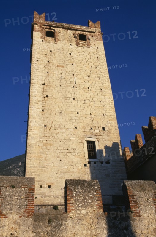 ITALY, Veneto, Lake Garda, Malcesine.  Castello Scaligero fortified tower and crenellated walls.