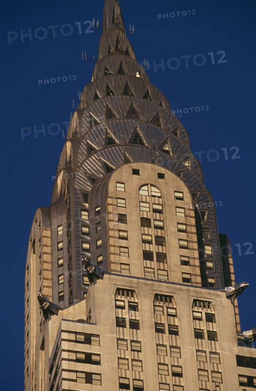 USA, New York, New York City, Part view of the Chrysler Building from Lexington Avenue.  Steel framed Art Deco skyscraper built 1928-1930.  Designed by architect William Van Alen.