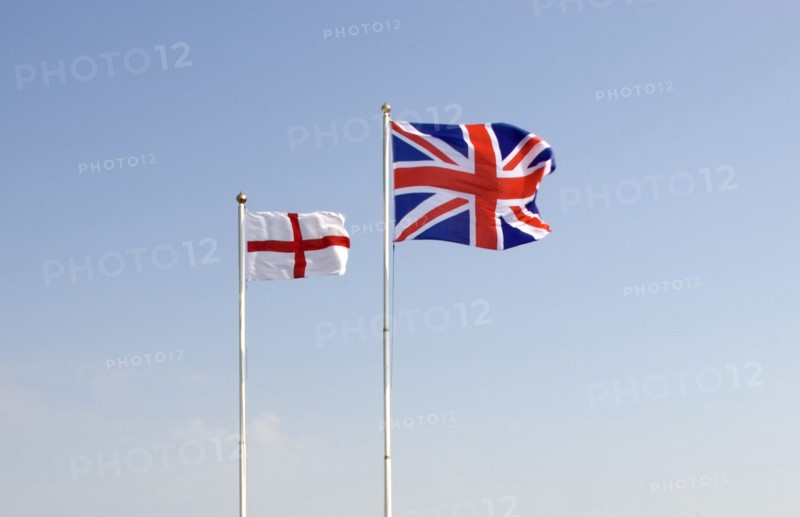 WEATHER, Climate, Wind, British Union Jack and St George Cross flags fyling against a blue sky
