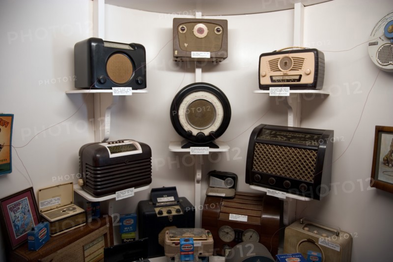 ENGLAND, West Sussex, Amberley, Amberley Working Museum. The Vintage Wireless Exhibition with display of domestic radio equipment