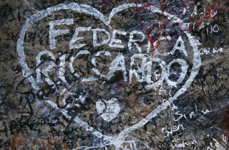 ITALY, Veneto, Verona, "Detail of lover’s graffiti at Juliet’s house, the Casa di Giulietta, number twenty-seven Via Cappello.  Names enclosed by white outline of a heart."