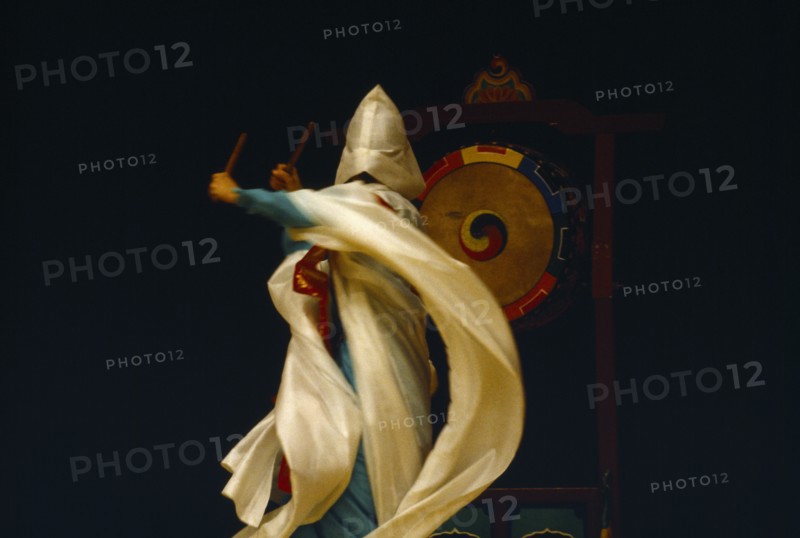 SOUTH KOREA, Seoul, "Buddhist drum dance adapted for National Theatre performance.  Also found in kisaeng houses, which resemble the geisha houses of Japan.  Highly developed art form of fluid movement and never static."