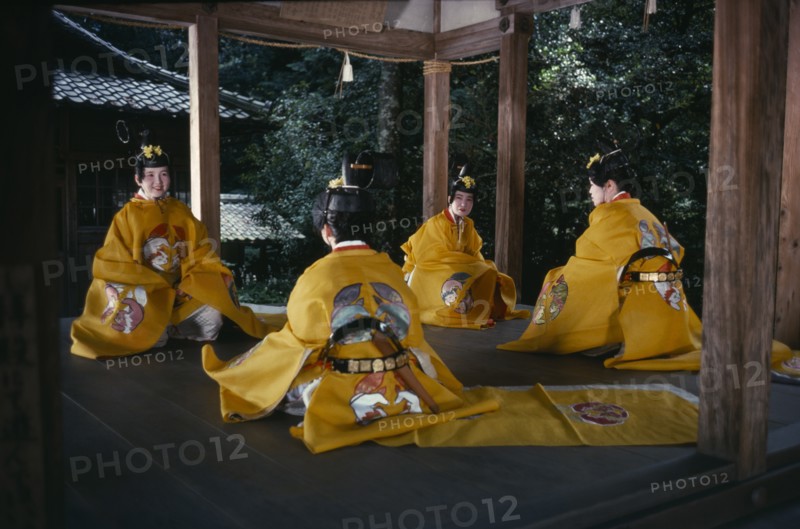 JAPAN, Honshu, Kyoto, "Sagimori Shrine.  Bugaku has been preserved for over a thousand years by courtiers of the Imperial Palace, normally performed exclusively by men, these girls dressed in traditional yellow costume, are amateurs performing the old dances chiefly for their own amusement. "