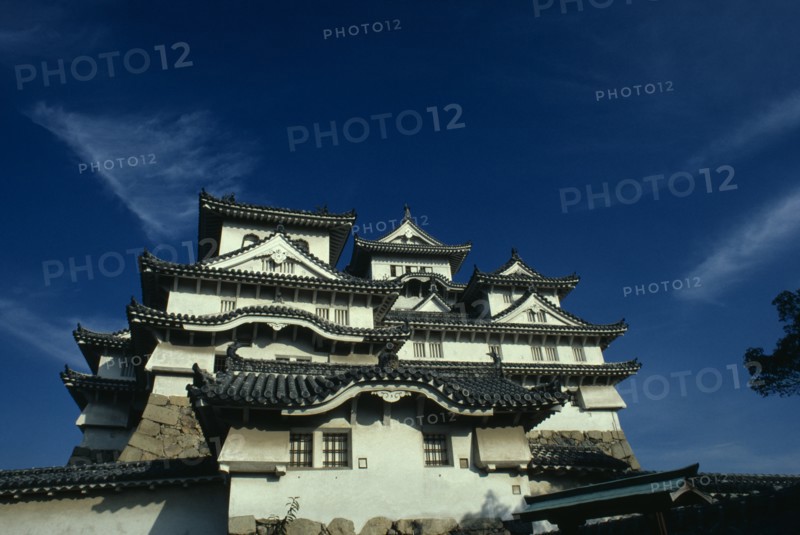 JAPAN, Honshu, Himeji, "Himeji-jo also known as Shirasagi-jo, the white egret or white heron castle.  Feudal castle built by Hideyoshi in 1581, a civil war baron or sengoku daimyo who had risen from the ranks of foot soldier and acquired status.  Central donjon or keep known as tenshu-kaku, the high structure of the heavenly protector. "
