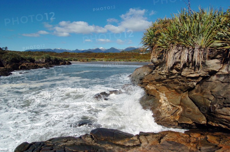 NEW ZEALAND, SOUTH ISLAND, CHARLESTON, "CONSTANT BAY , CHARLESTON, ON THE WEST COAST OF NEW ZEALANDS SOUTH ISLAND LOOKING EAST TOWARDS THE PAPAROA NATIONAL PARK AND ST ARNAUD MOUNTAIN RANGE."