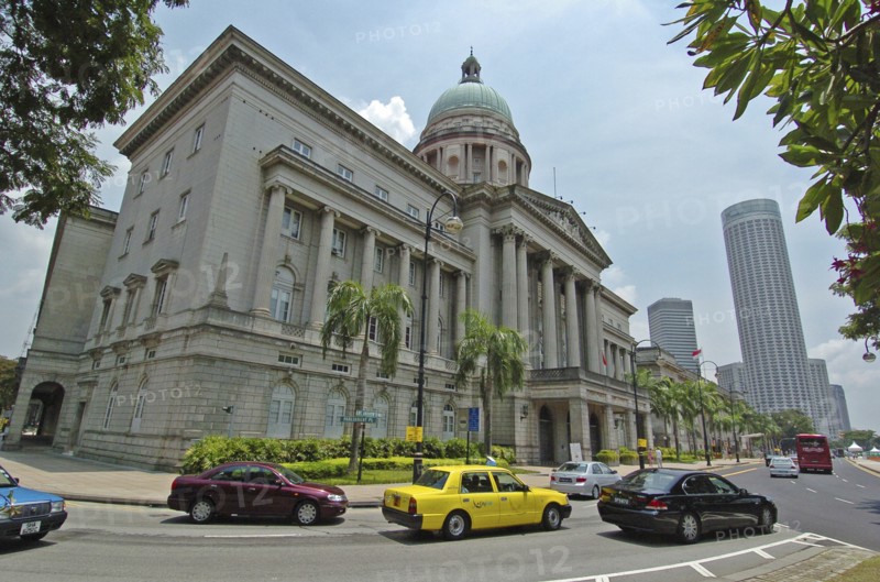 SINGAPORE, Downtown, Old colonial building with new high rise buildings in the background.