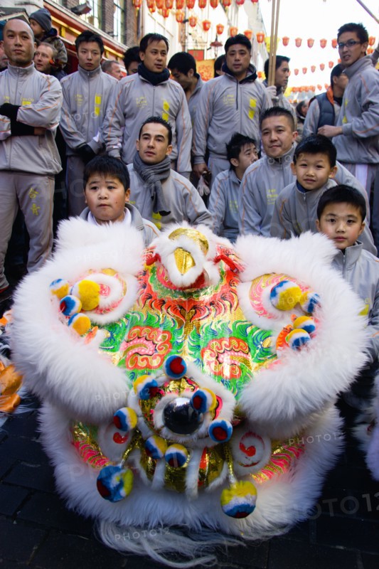 ENGLAND, London, Chinatown, Lion Dance troupe performing in Gerrard Street during Chinese New Year celebrations in 2006 for the coming Year of The Dog