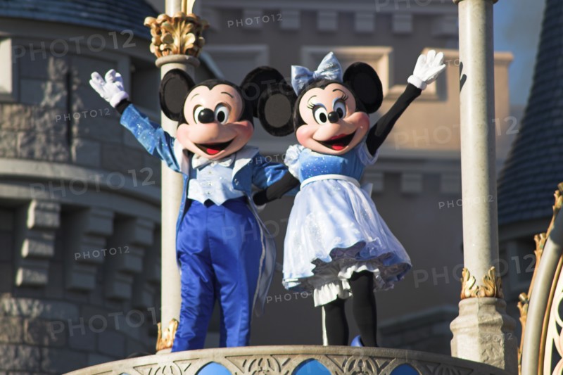USA, Florida, Orlando, Walt Disney World Resort. Mickey and Minnie Mouse characters on stage in the Magic Kingdom.