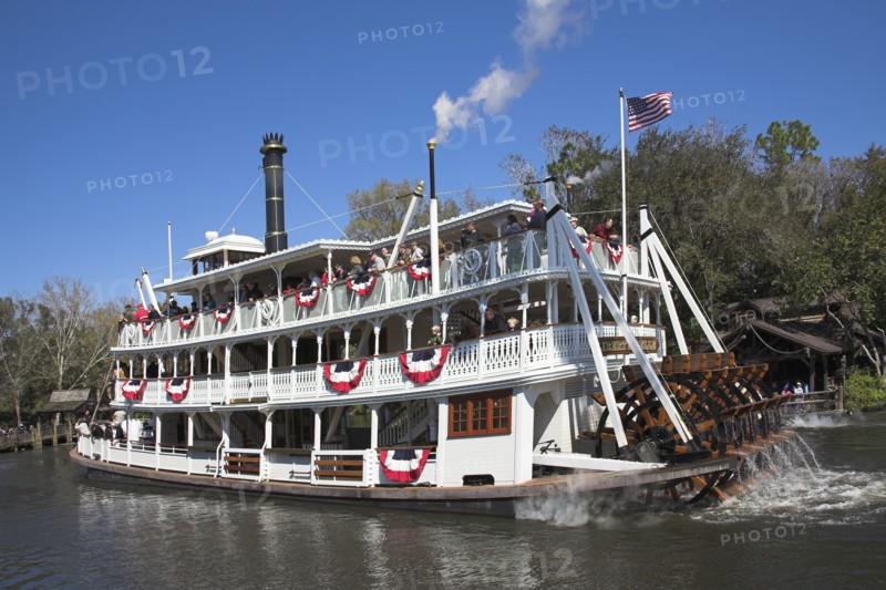 USA, Florida, Orlando, "Walt Disney World Resort. Liberty Belle Paddle Steamer, Liberty Square Riverboat on a lake in the Magic Kingdom."