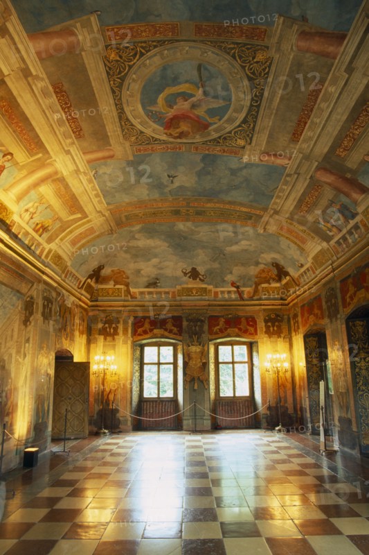 AUSTRIA, Salzburg, "Hellbrunn Palace, dating from early 17th c.  Interior of banqueting hall with  trompe l’oeil painting covering walls and ceiling and chequered floor.  "