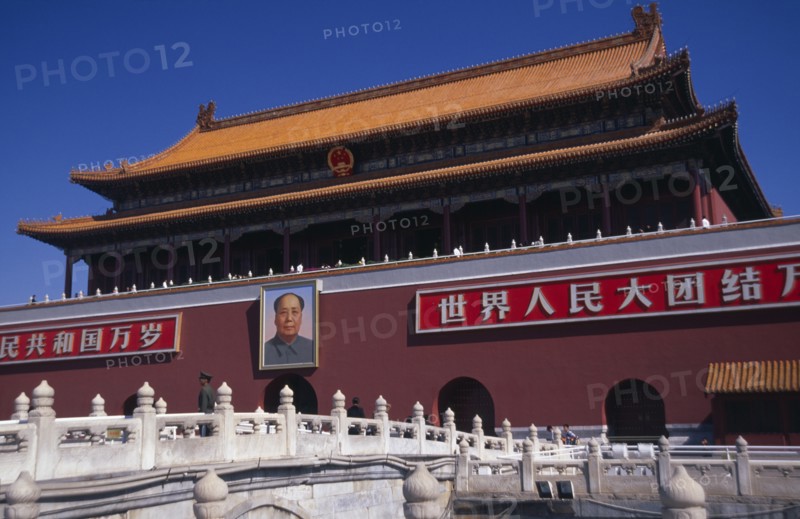 CHINA, Beijing, Entrance gateway to the Forbidden City from Tiananmen Square with portrait of Mao on exterior wall.