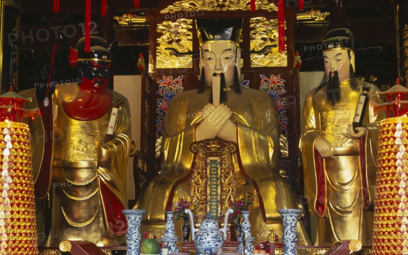 CHINA, Shanghai, "Yu Gardens, Temple of the City of God.  Three golden statues behind small altar.  "