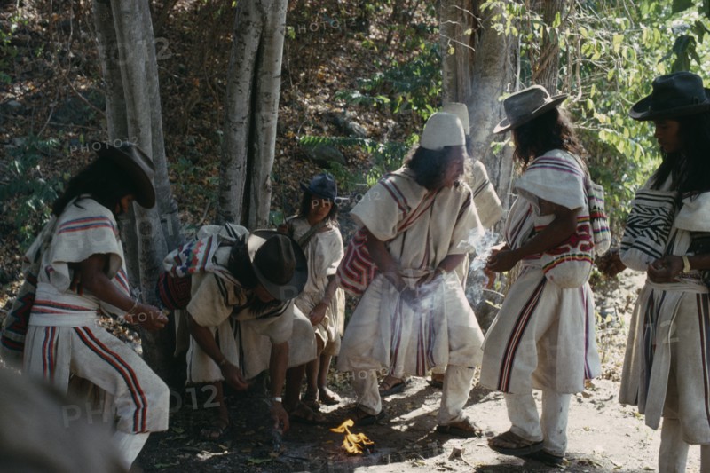 COLOMBIA, Sierra Nevada de Santa Marta, Ika, Ika Mortuary rites being performed in the rio Guatapuri valley for three Ika leaders murdered by right-wing paramilitaries linked to the Colombian Army. Arhuaco Aruaco indigenous tribe mourning funeral death American Colombia Hispanic Indegent Latin America Latino Religion South America  Arhuaco Aruaco indigenous tribe mourning funeral death American Columbia Hispanic Indegent Latin America Latino Religion South America 3 Religious