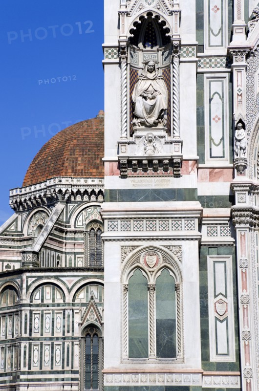 ITALY, Tuscany, Florence, "The Neo-Gothic marble west facade of the Cathedral of Santa Maria del Fiore, the Duomo, with Brunellaschi's Dome beyond"