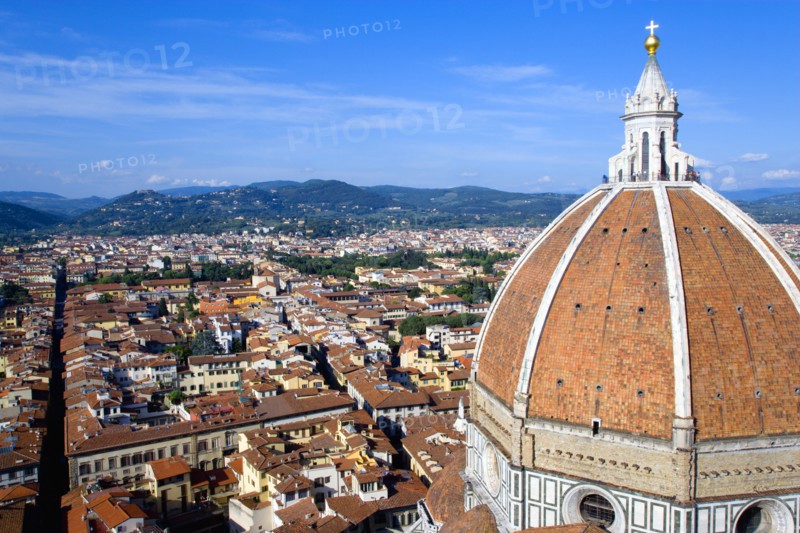 ITALY, Tuscany, Florence, "The Dome of the Cathedral of Santa Maria del Fiore, the Duomo, by Brunelleschi with tourists on the viewing platform looking over the city towards the surrounding hills"