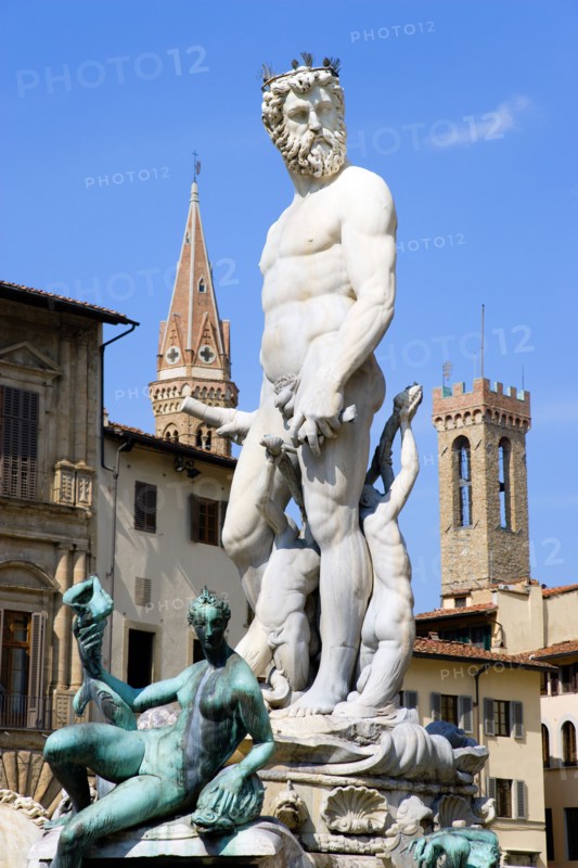 ITALY, Tuscany, Florence, "The 1575 Mannerist Neptune fountain, with the Roman sea God surrounded by water nymphs commemorating Tuscan naval victories, by Ammannatti in the Piazza della Signoria beside the Palazzo Vecchio"