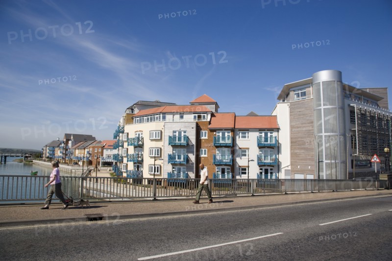 ENGLAND, West Sussex, Shoreham-by-Sea, Ropetackle modern housing development apartments on the banks of the river Adur seen from the Norfolk bridge. A regenerated brownfield former industrial area.