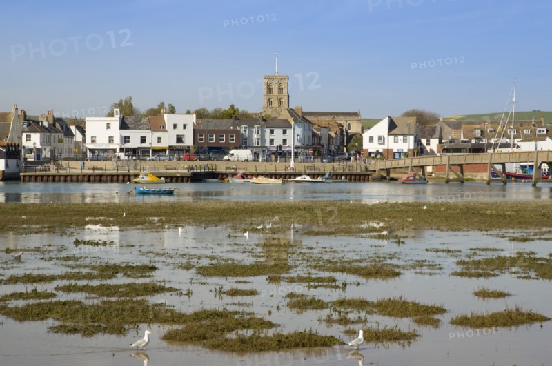 ENGLAND, West Sussex, Shoreham-by-Sea, View across the river Adur mud flats toward the won centre.