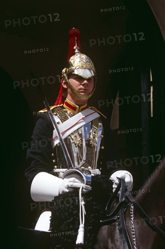 ENGLAND, London, "Whitehall, horse guard sitting on horse outside Horse Guards Parade."