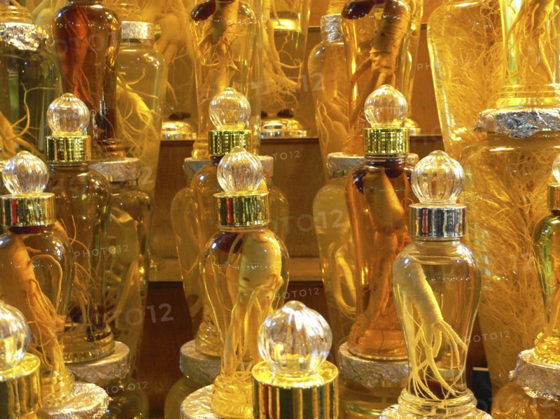 KOREA, South, Seoul, "Namdaemun market, ginseng root in glass jars"