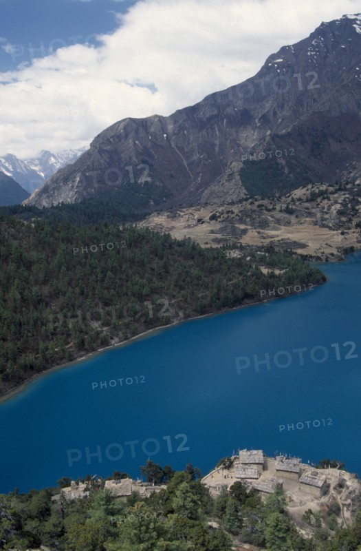 NEPAL, Lower Dolpo Trek, Phoksumdo, View south west over Pal Sentan Thasoon Chholing Monastery and Phoksumdo Lake