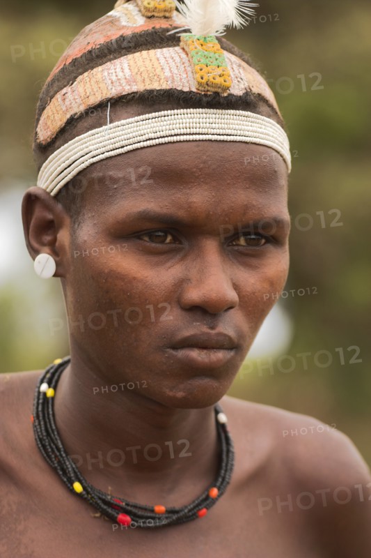 ETHIOPIA, Lower Omo Valley, Village near Omorate, Dassanech man.