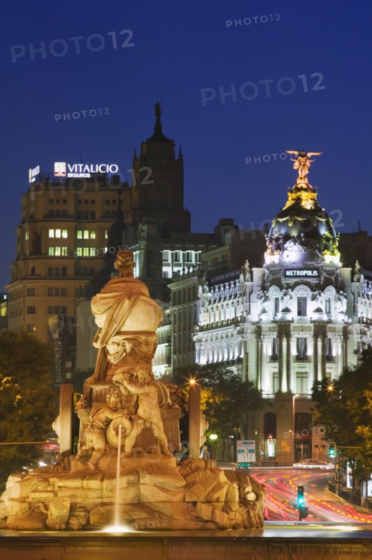 SPAIN, Madrid, The fountain in Plaza Cibeles at dusk.