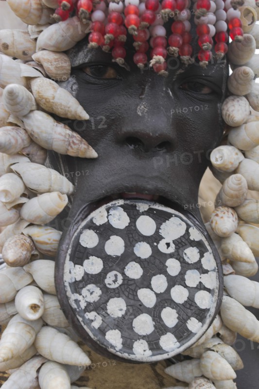 ETHIOPIA, South Omo Valley, Mursi Tribe, Woman with lip plate.