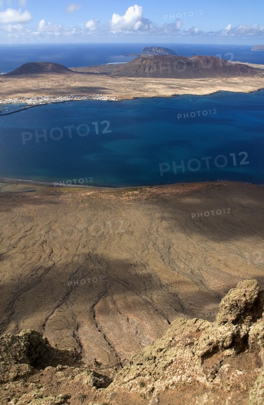 SPAIN, Canary  Islands, Lanzarote, Mirador del Rio viewpoint 497 metres or 1630 feet above sea level lwith view across the Rio strait towards La Graciosa. Location created by Cesar Manrique in 1973.