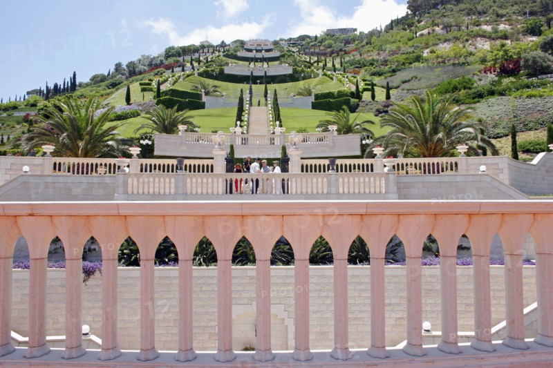 ISRAEL, Northern Coast, Haifa, Zionism Avenue.  View of Baha'i gardens built as memorial to founders of the Baha’i faith.  Colonnaded balcony in foreground with view across tiered gardens stretching out beyond.
