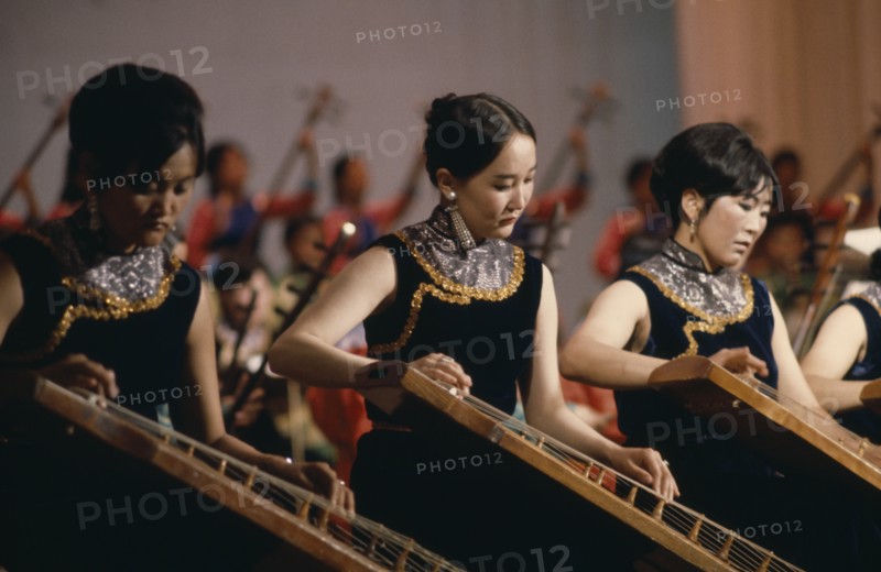 MONGOLIA, Music, Altai Provincial Orchestra musicians playing Mongolian national music on traditional stringed instruments. East Asia Asian Mongol Uls