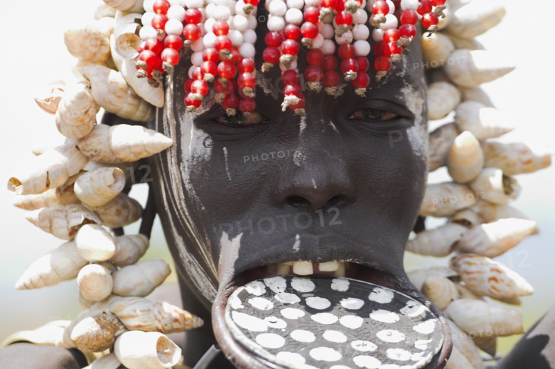ETHIOPIA, South Omo Valley, Mursi Tribe, Woman with lip plate.