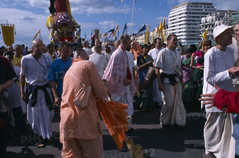 ENGLAND, East Sussex, Brighton, Hare Krishna taking part in a parade on Brighton seafront