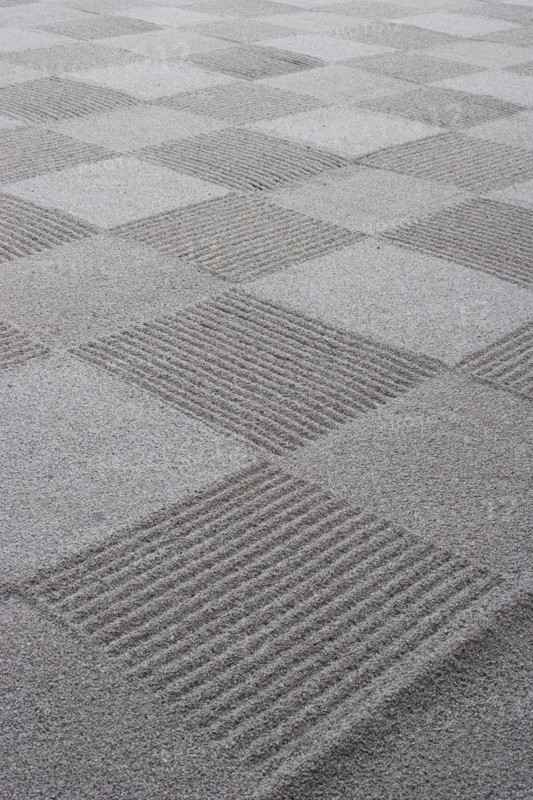 JAPAN, Honshu, Kyoto, "Ryoan-ji, Ukyo-ku.  Zen sand garden made by Zen Buddhist monks at Ryoan - ji temple.  Close cropped detail of chequer-board pattern effect. "