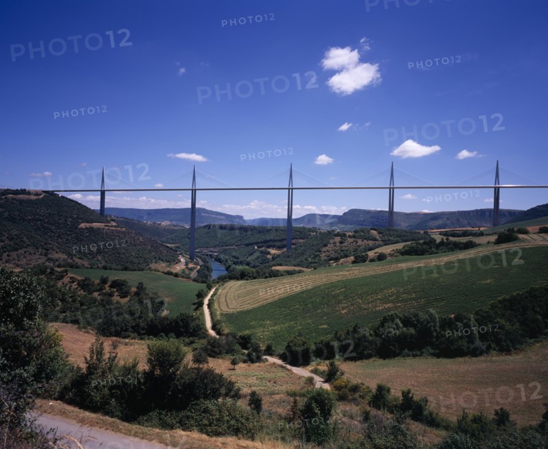 FRANCE, Midi-Pyrenees, Aveyron, Millau bridge which spans the Tarn River Valley and carries the A75 motorway from Beziers to Clermont Ferrand.  Seen from the west.