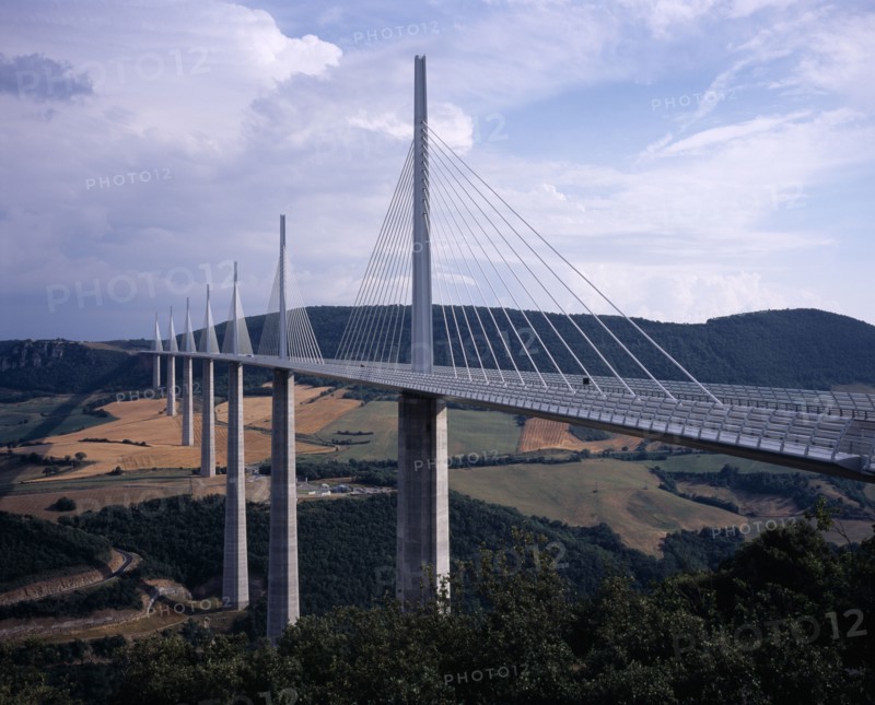 FRANCE, Midi Pyrenees, Aveyron, North end of the Millau bridge crossing the Tarn Valley carrying the A75 motorway linking Beziers in the south with Clermont Ferrand in the north.