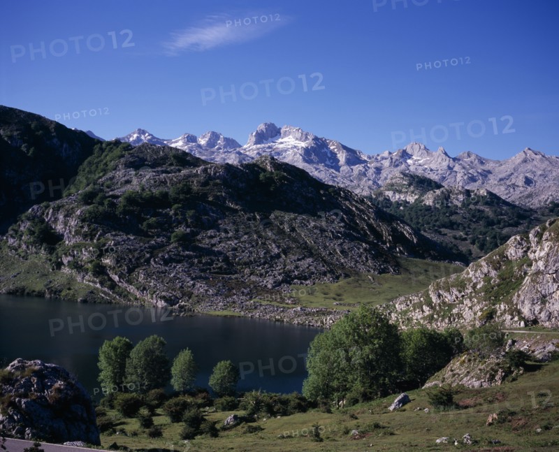 SPAIN, Asturias, Picos de Europa, Cornian mountain group also known as the Western Massif.  View from north over Lago Enol