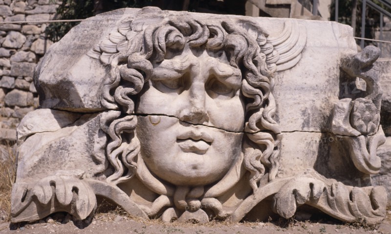 TURKEY, Altinkum, Didyma, Temple of Apollo.  Carved head of Medusa.
