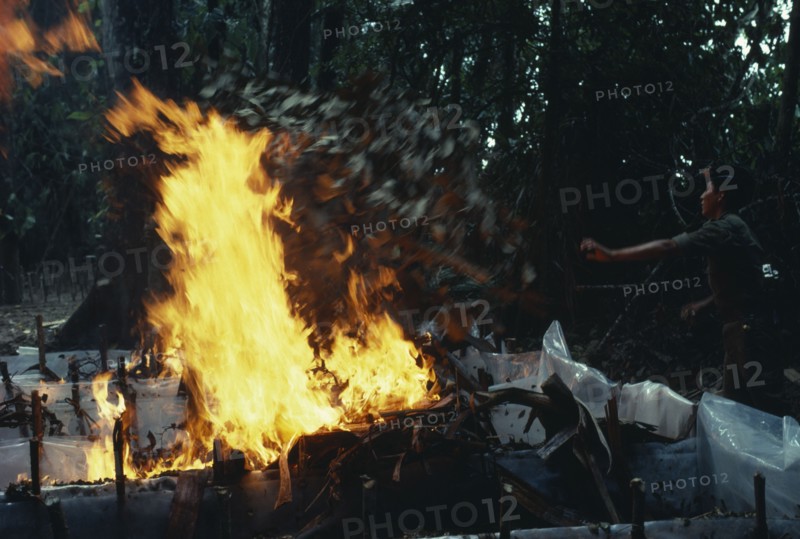 COLOMBIA, , The army burning and destroying a jungle cocaine laboratory in the war against illegal drugs